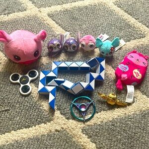 Squishies, fidget spinners, and a random thing that I have no clue what it is!